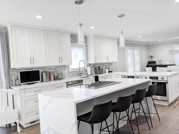 beautiful recently renovated kitchen with best kitchen features like mid back non-turning bar stools