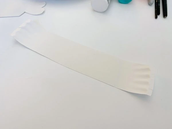 First step for this fish craft for preschoolers