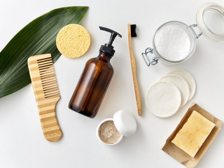 organic beauty products on white background, top view, flat lay.